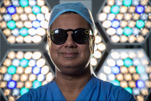 Surgeon Shafi Ahmed poses for a photograph wearing a pair of Snap Inc. Spectacles inside his operating theater at the Royal London Hospital, part of the Barts Health NHS Trust, in London, U.K., on Thursday, Jan. 11, 2018. Chris J. Ratcliffe—Bloomberg/Getty Images